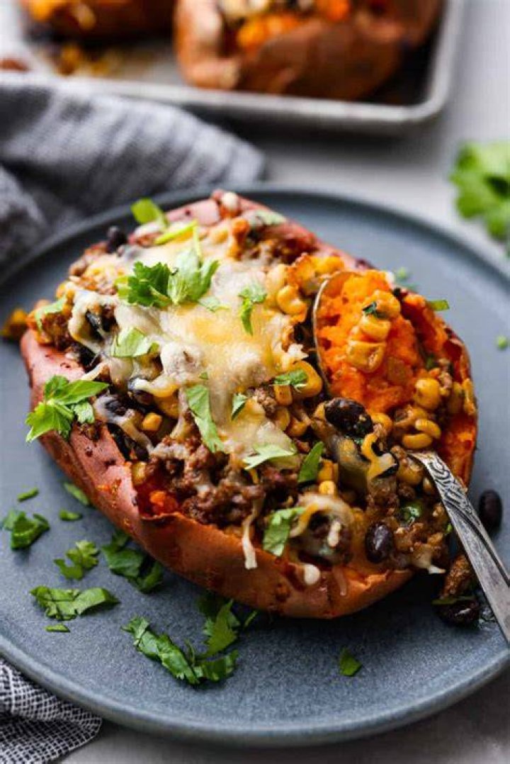 Baked sweet potato stuffed with sloppy joe meat