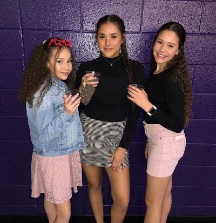Gracie Haschak with her sisters
