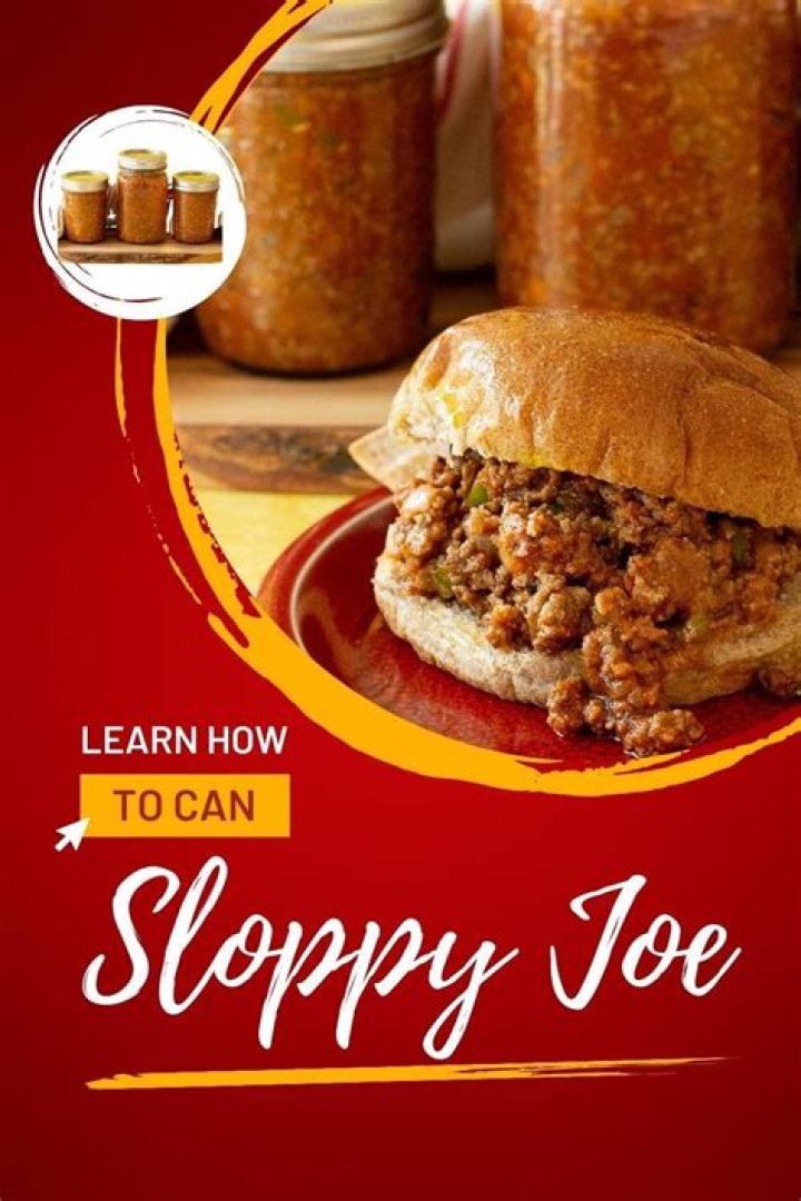 Sloppy joe meat in a pan with a wooden spoon